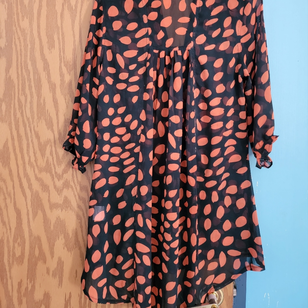Orange and black top